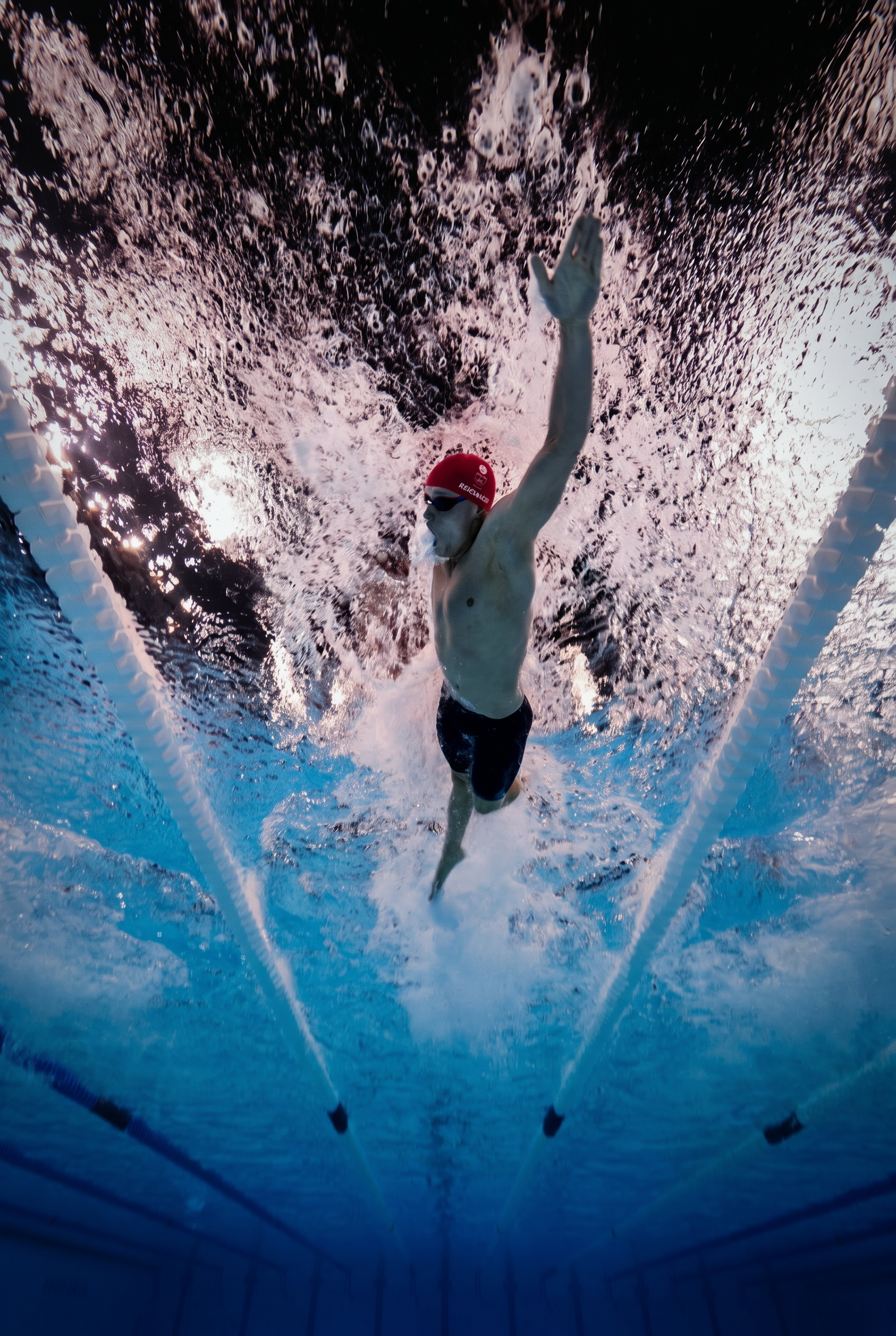 Matt Richards mid-race underwater, arm extended in freestyle stroke
